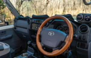 Steering wheel cover fitted to a car steering wheel
