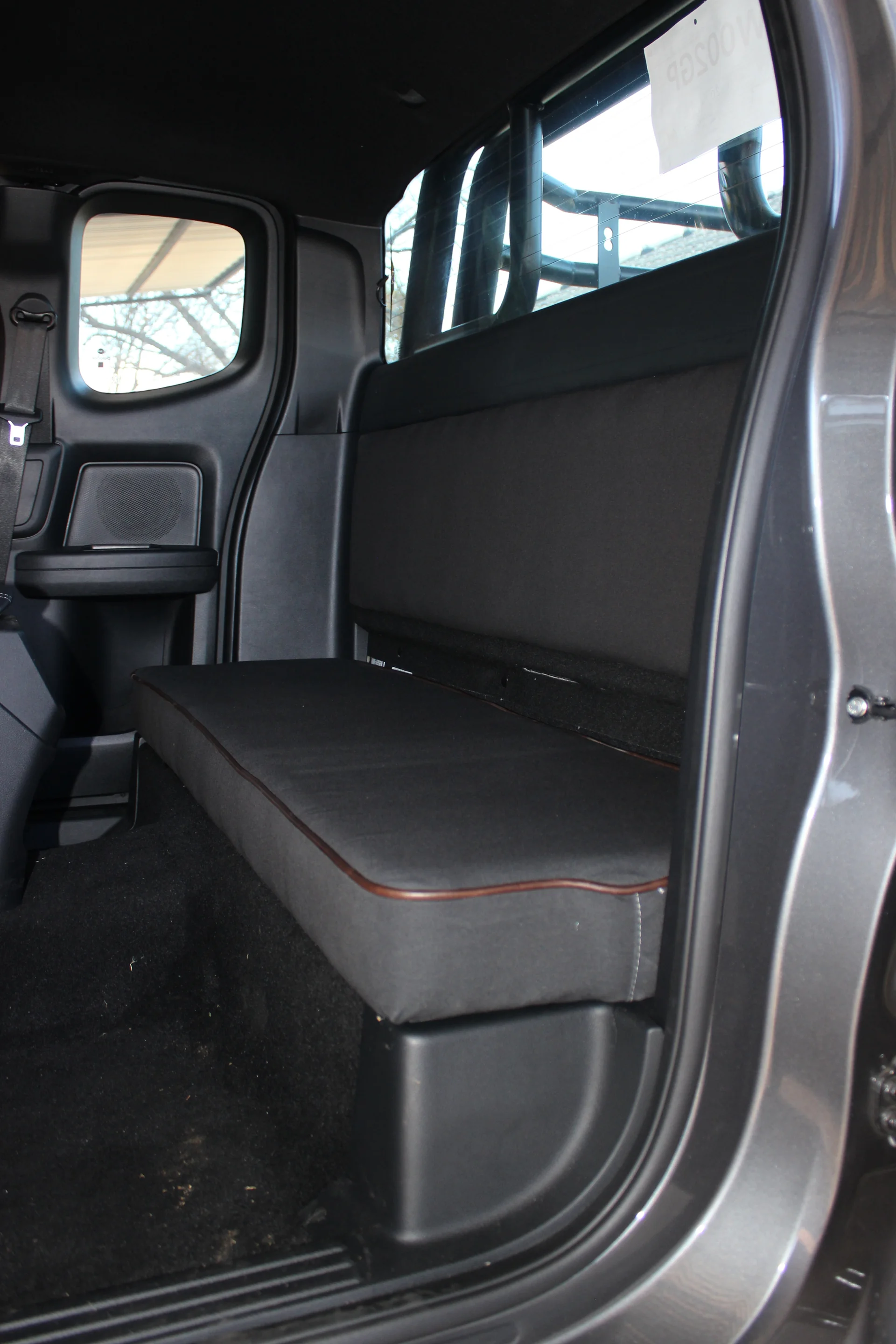 Sand coloured seat cover fabric with visible weave detail
