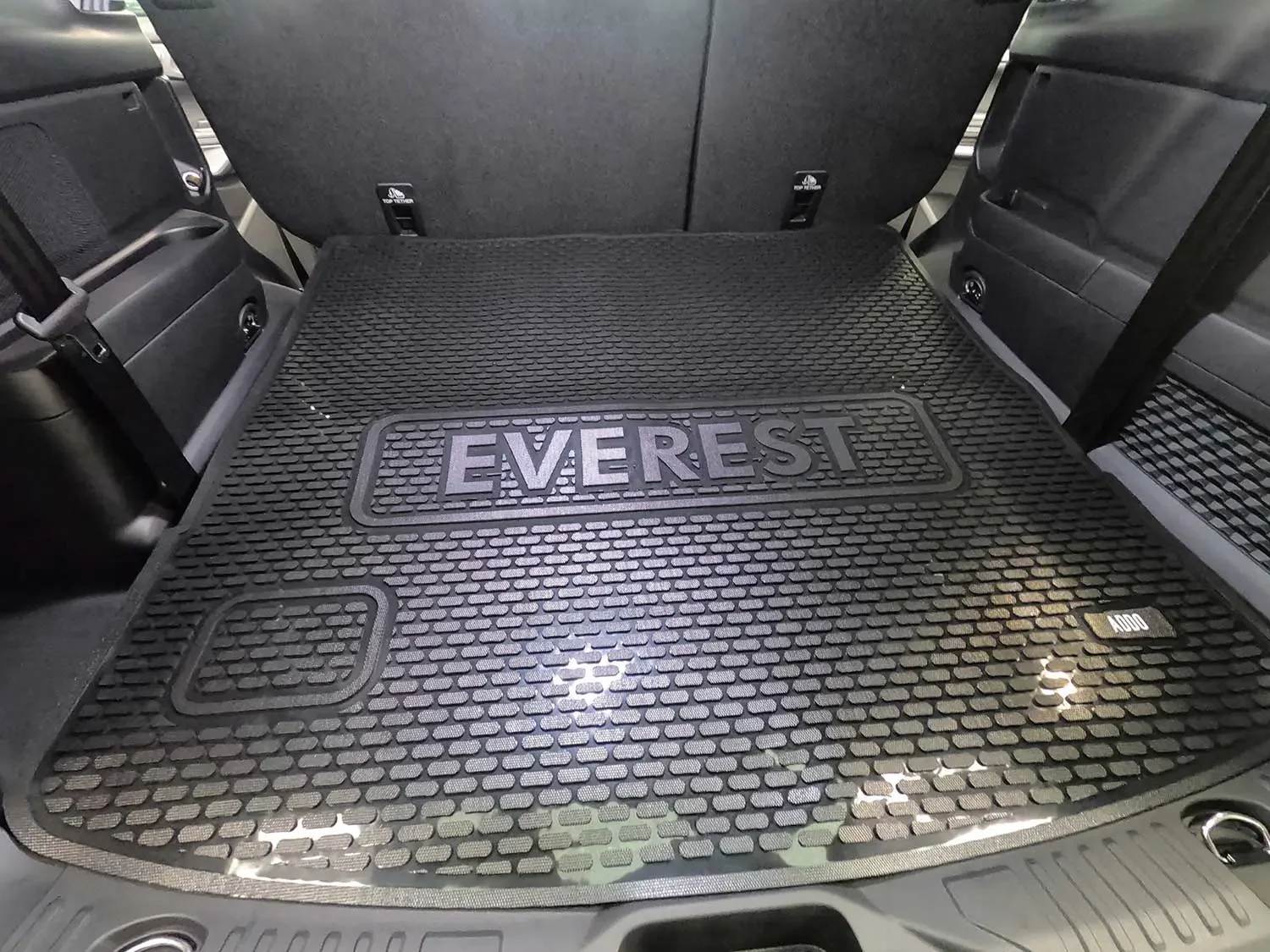 Car interior detailing with rubber floor mats in place