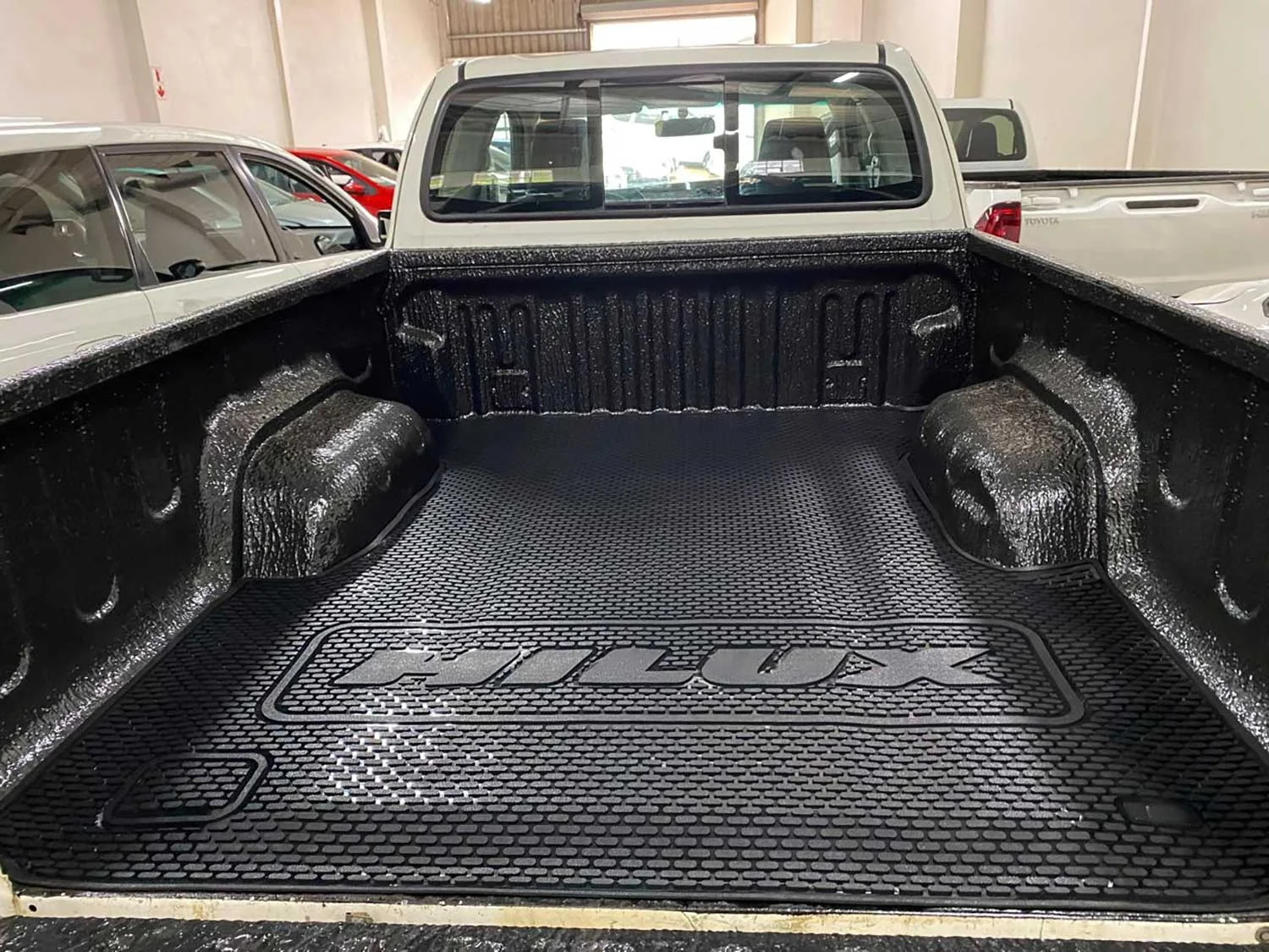 Full set of rubber mats fitted across a vehicle interior
